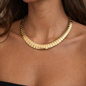 Vintage Monet  High Polish Gold-tone 16mm Omega Statement Necklace